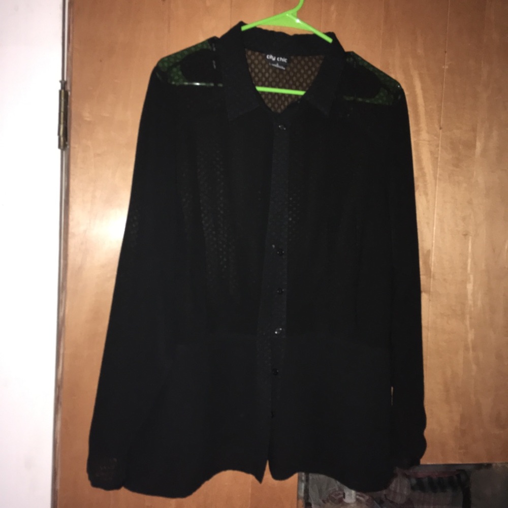 Woman’s sheer black blouse